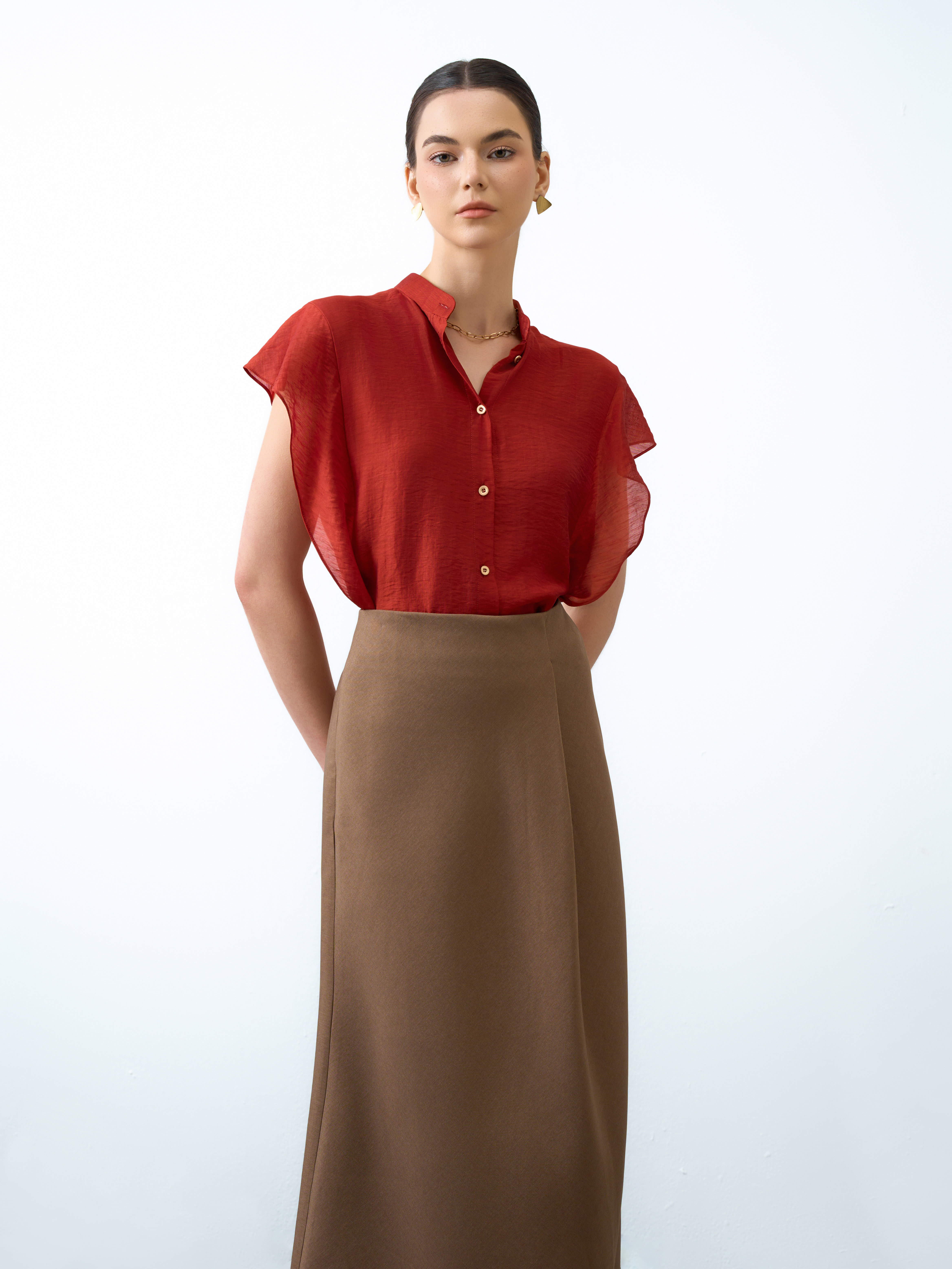 Chân váy midi xếp ly chéo