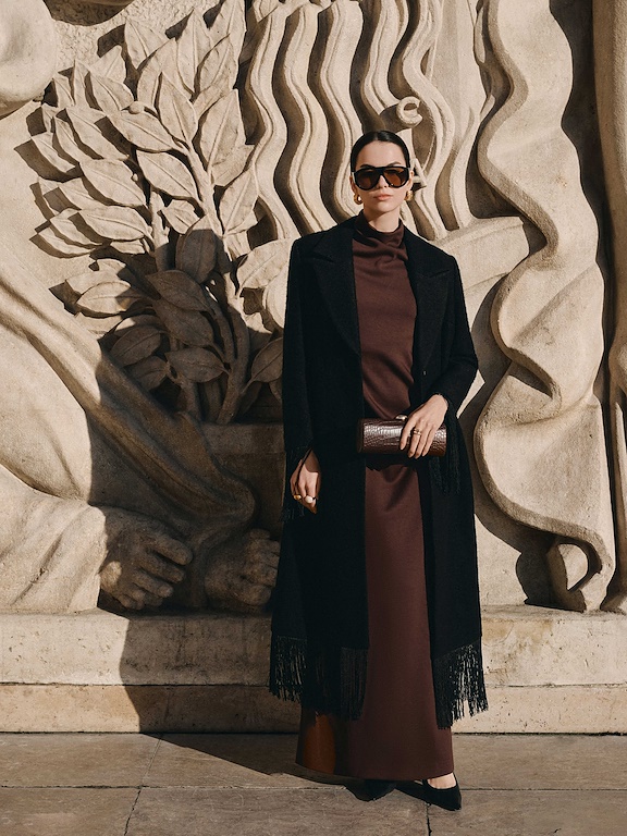 Áo măng tô gấu tua rua