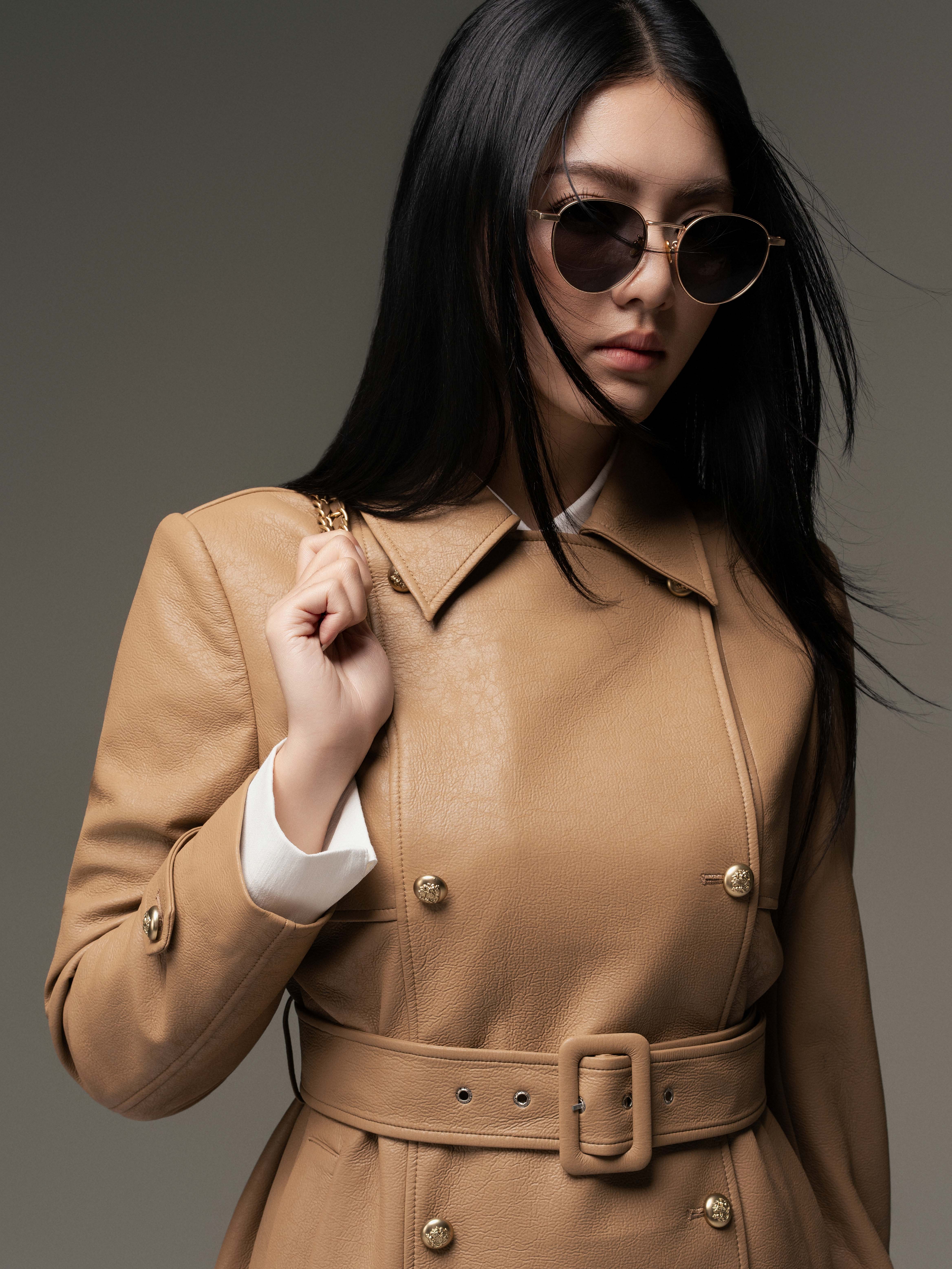 Áo da hai hàng cúc thắt nơ ngoài