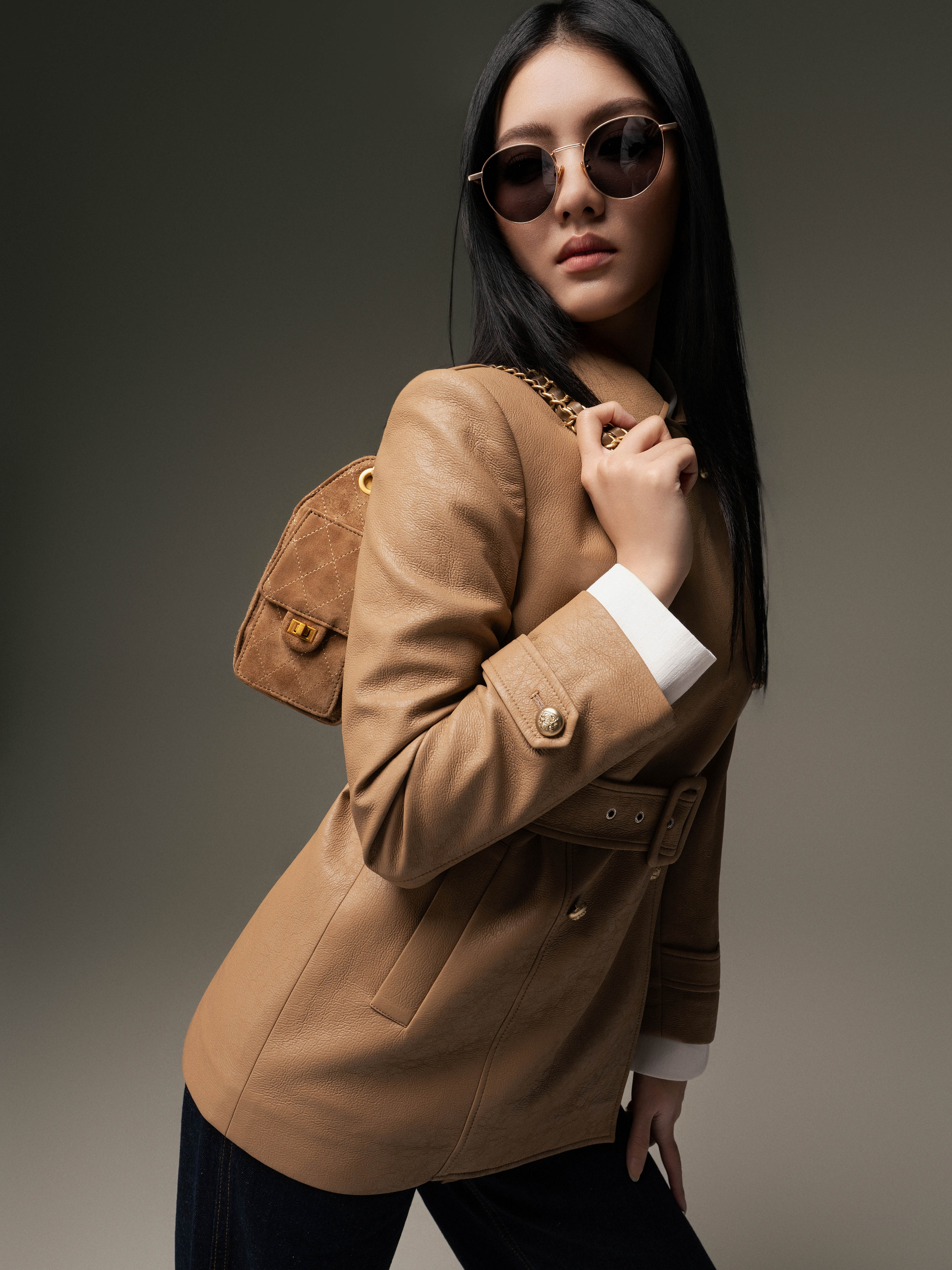 Áo da hai hàng cúc thắt nơ ngoài