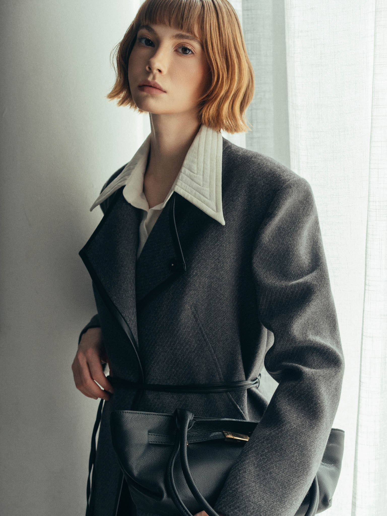 Áo trendcoat cổ chéo nẹp viền da